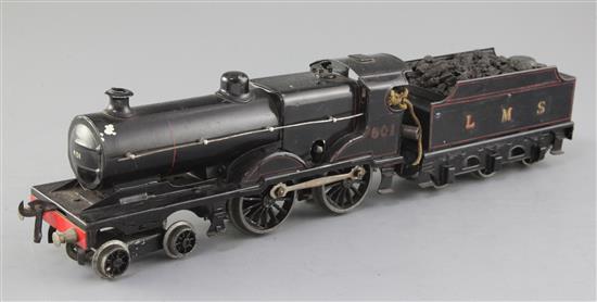 A Bassett-Lowke? O gauge clockwork 4-4-0 compound locomotive and tender, number 601, black livery LMS, overall length 39cms